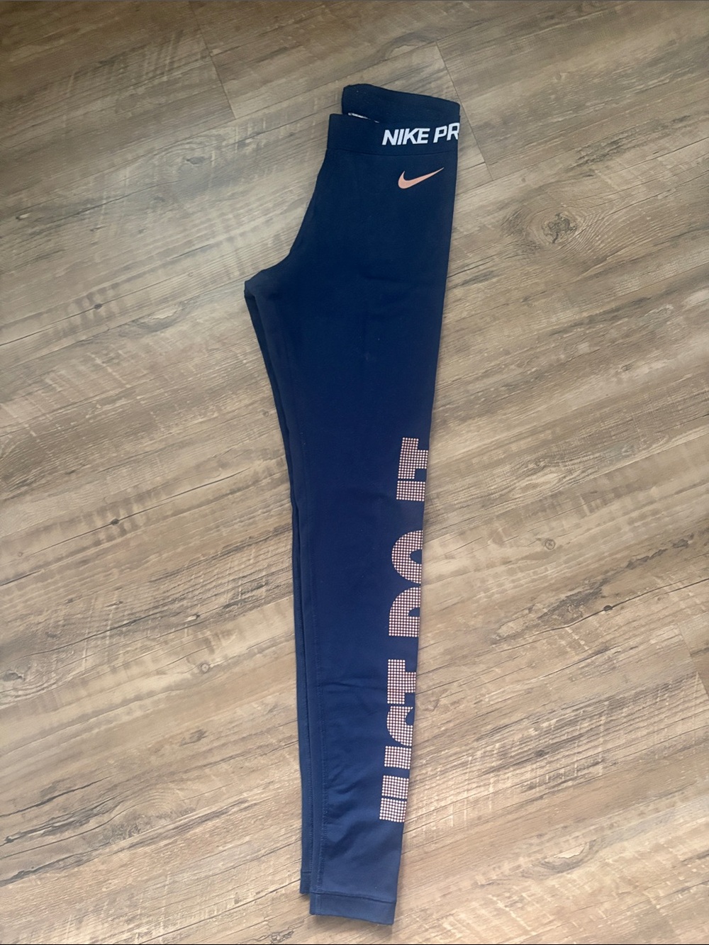 Nike Pro Navy Leggings with Peach Swoosh and Side Print